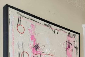edgy wall art black, white, and pink color scheme