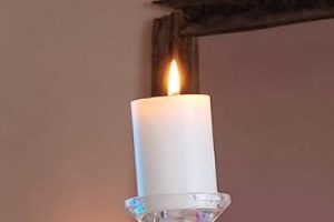 Wine glasses with a single candle