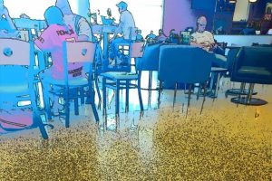 shot of feet and purse in a room of people and tables